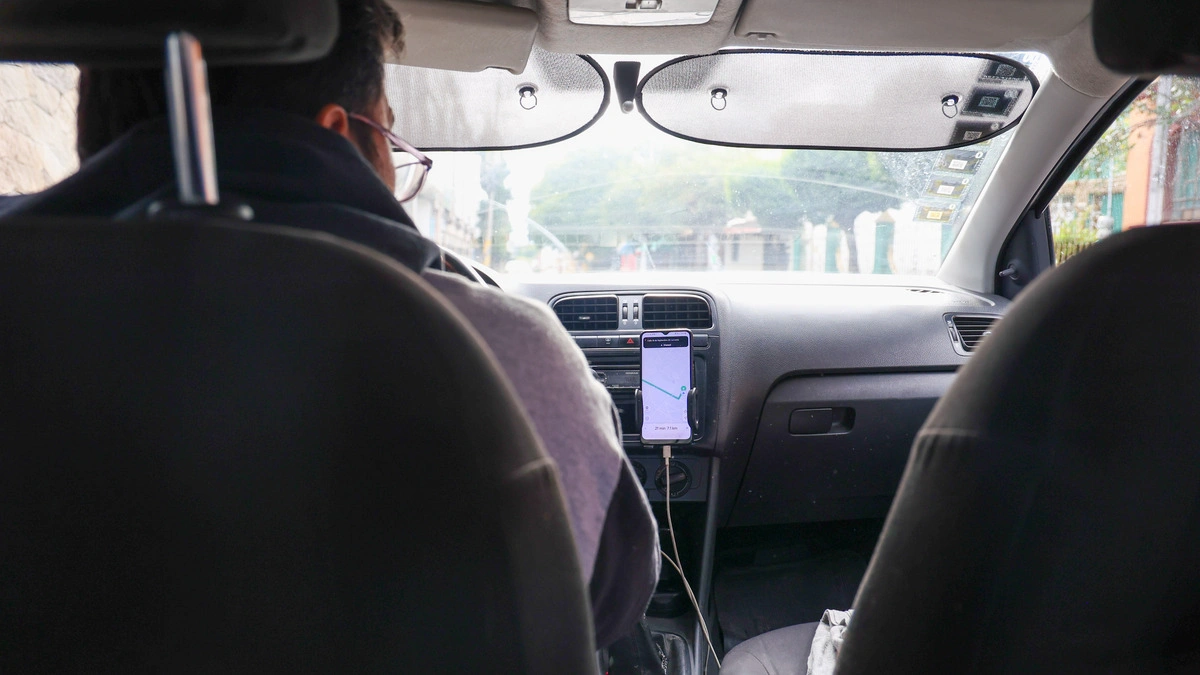 Movilidad buscará eliminar tarifa dinámica de DiDi y Uber en Puebla  